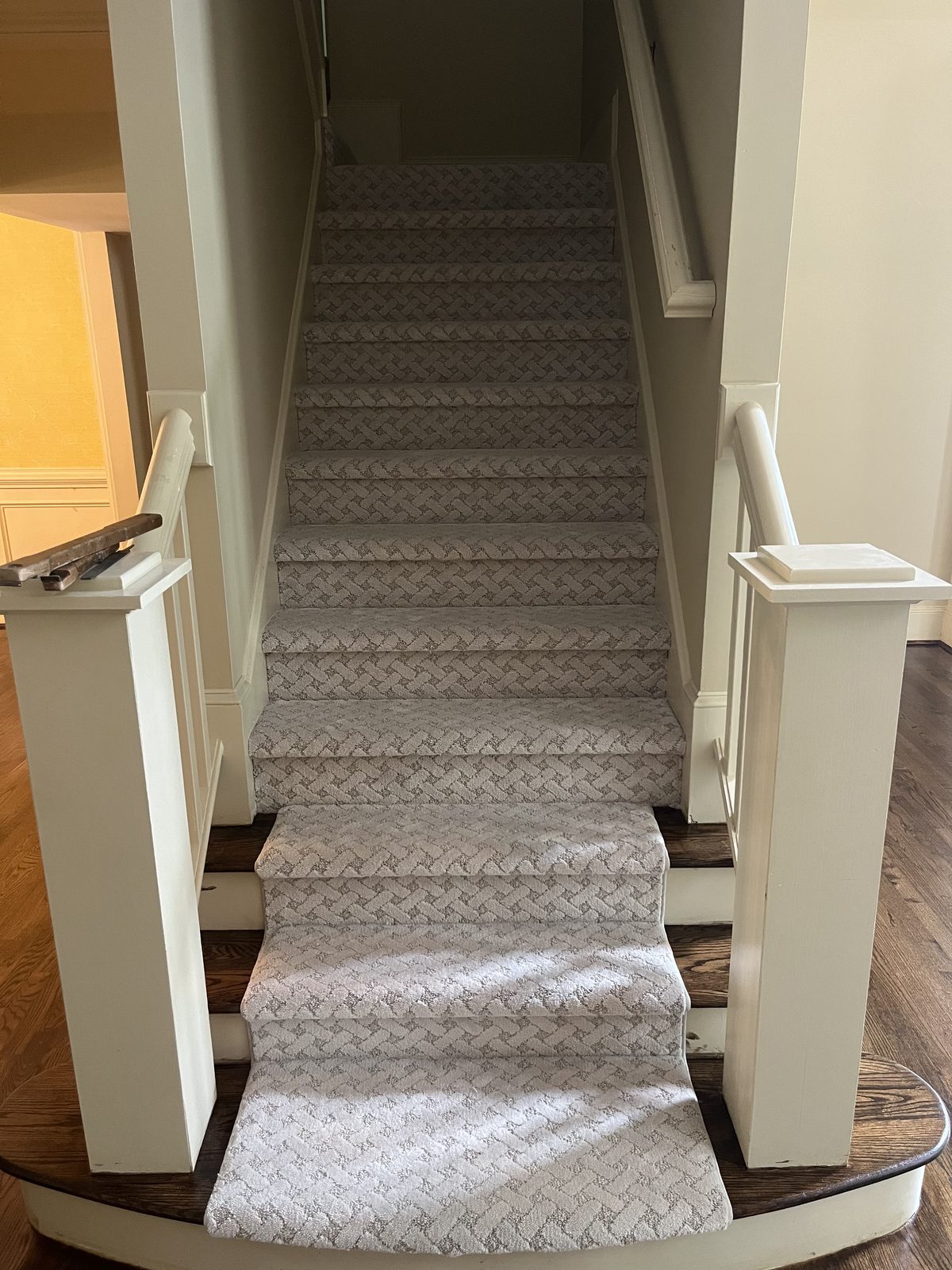 Patterned carpet installation on a staircase